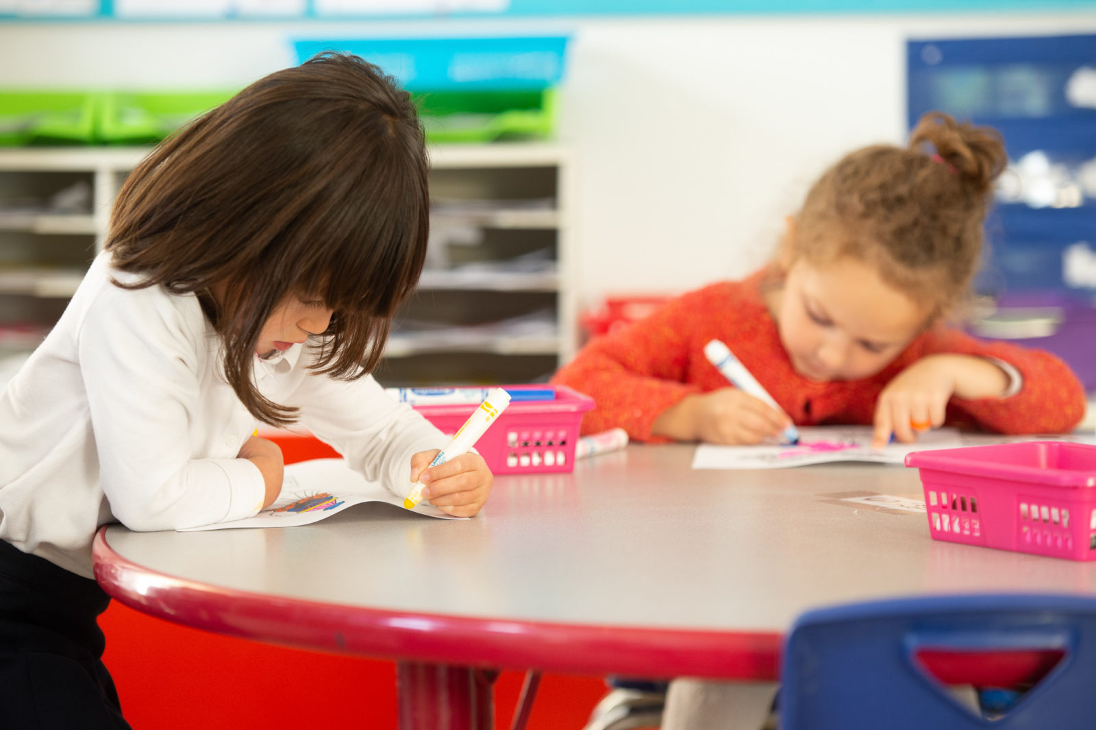 Kindergarten girls working in class