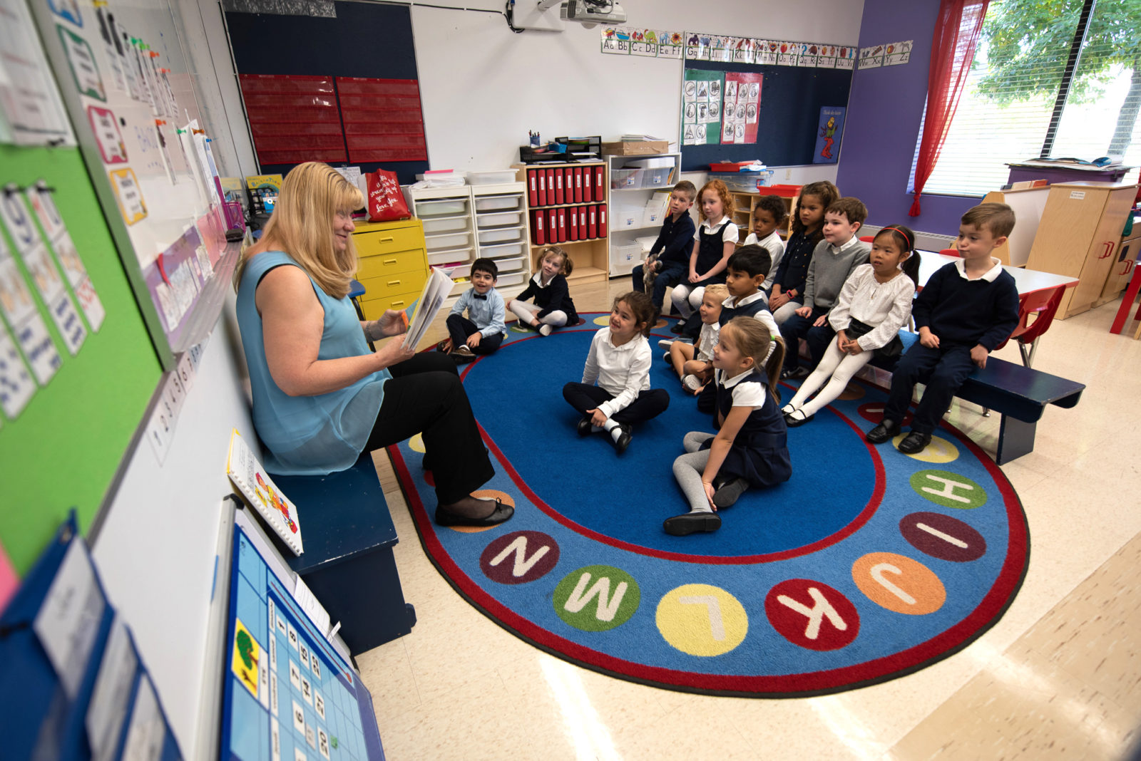 Kindergarten students listening in class