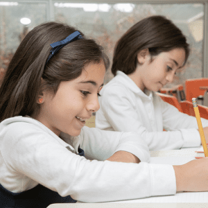 private school elementary girls working
